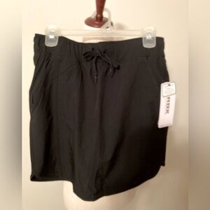 RBX Women's Black Skort with pockets. NWT Size S